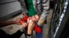 FILE - A boy receives a polio vaccination during a polio immunization campaign in Sana'a, Yemen. 