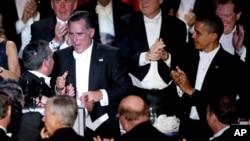 President Barack Obama and Republican presidential candidate Mitt Romney attend at the Archdiocese of New York's 67th Annual Alfred. E. Smith Memorial Foundation Dinner at the Waldorf Astoria Hotel in New York, October 18, 2012.