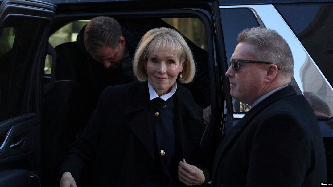 FILE - E. Jean Carroll enters Manhattan Federal Court on Jan. 22, 2024, in New York. The trial in her defamation case against former U.S. President Donald Trump was postponed for a second time and will resume on Jan. 25.