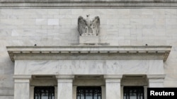 FILE - The Federal Reserve building is pictured in Washington, Aug. 22, 2018.
