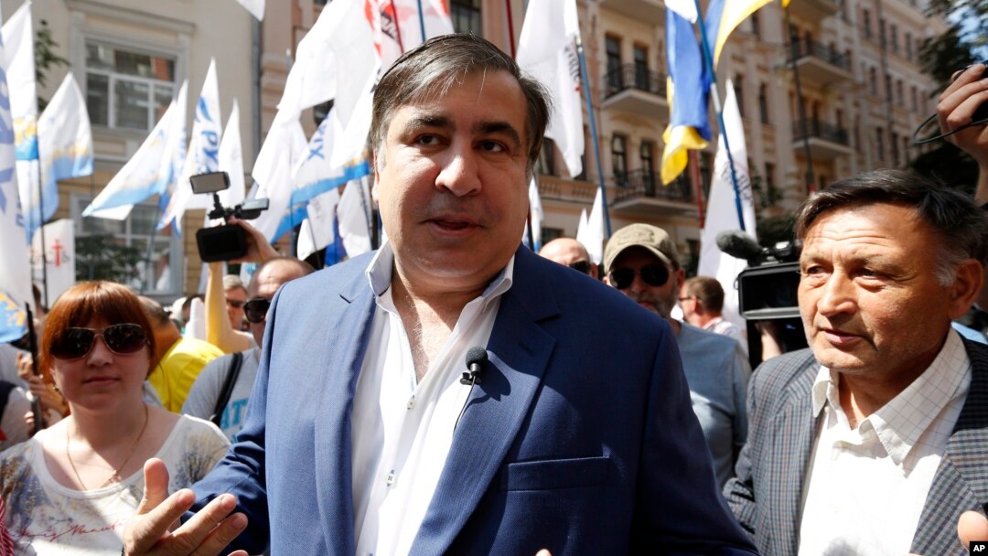 Mikhail Saakashvili, former Georgian president and former governor of the Ukrainian Odessa region, is surrounded by his supporters at a rally near the Justice Ministry in Kyiv, Ukraine, May 30, 2017. Saakashvili was stripped of his Ukrainian citizenship Wednesday.