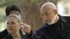 US Secretary of State Hillary Rodham Clinton, left, walks with President of Afghanistan Hamid Karzai to a press conference at the Presidential Palace in Kabul Saturday July 7, 2012.