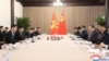 中朝承诺将加强两国关系，王沪宁：中朝友谊永不动摇